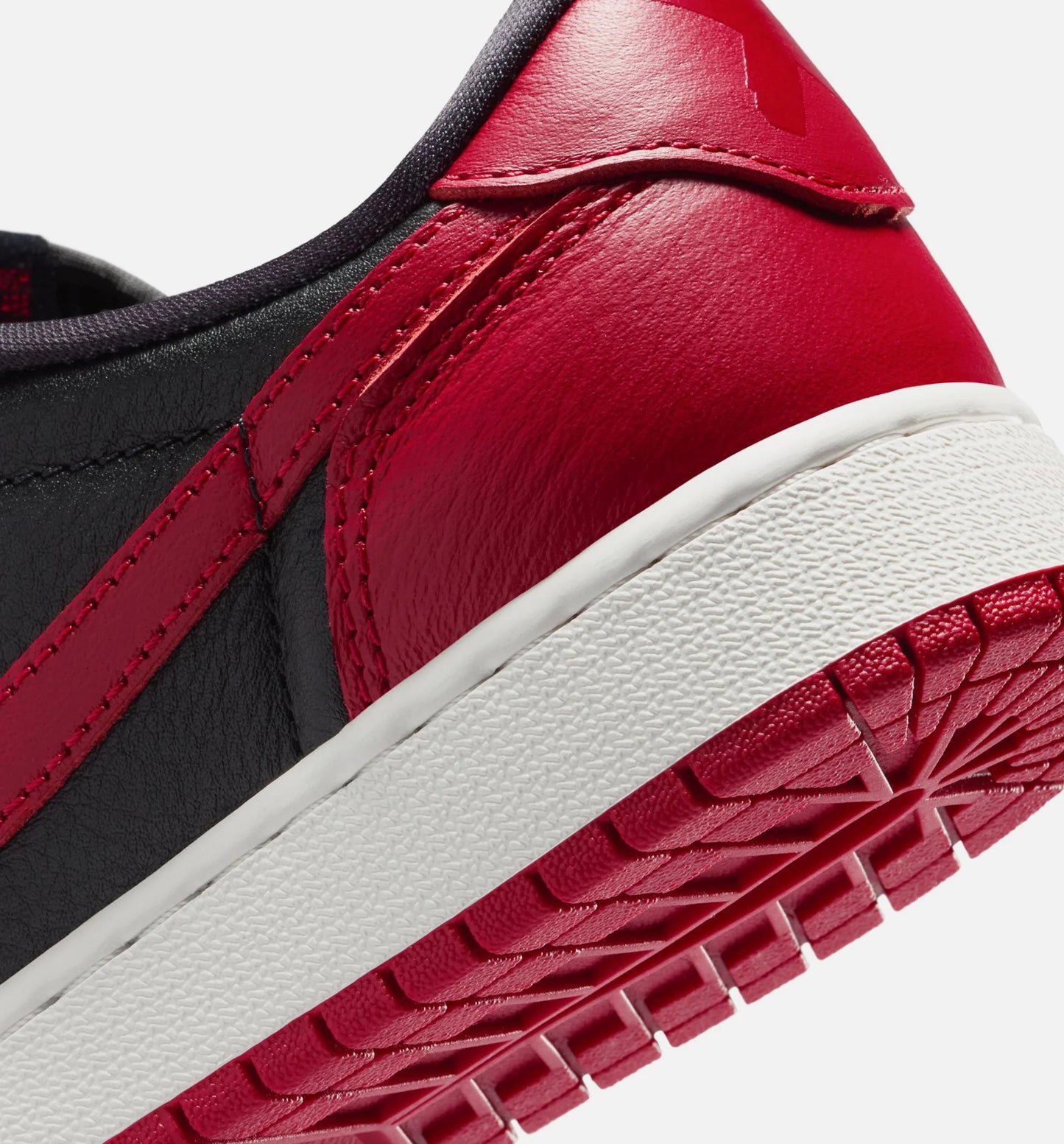 Air Jordan 1 Retro Low OG Banned Grade School Lifestyle Shoe Black Black Varsity Red Summit White Free Shipping